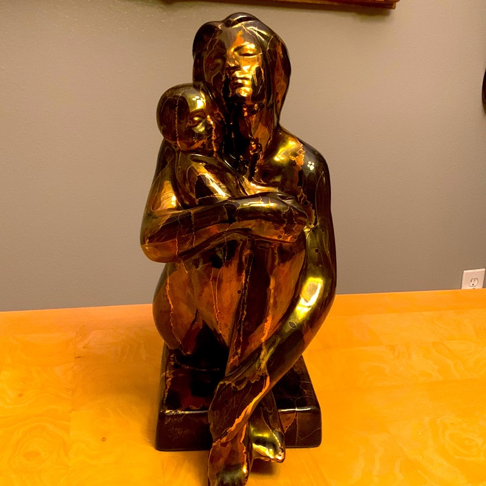 Black ceramic mother and baby figure